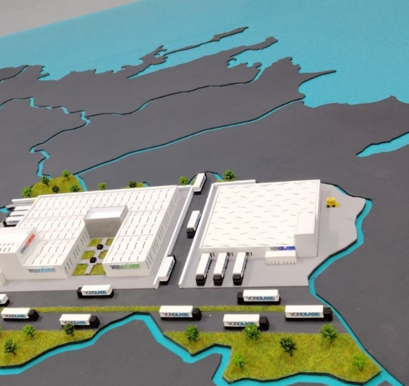 Maquettes personnalisées éclairées et animées par ARI Maquette pour la Baumesse Tulln, représentant des projets résidentiels modernes, des logements écologiques, des centrales solaires et éoliennes, des infrastructures durables et des villes futurist