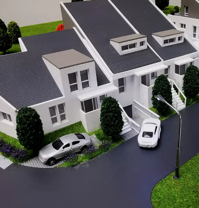Des maquettes éclairées et animées d’ARI Maquette pour le SIMA, représentant des complexes agricoles durables, des centres de technologie alimentaire, l’intégration des énergies renouvelables, des plateformes logistiques et des infrastructures agrico