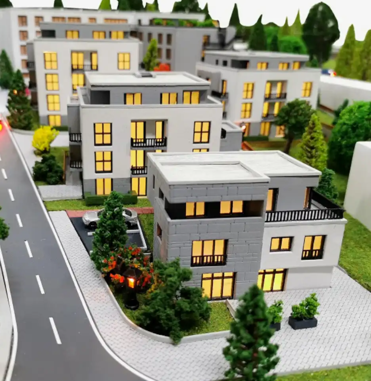 Maquettes animées et éclairées d’ARI Maquette pour Anuga, représentant des usines alimentaires modernes, des centres logistiques, des complexes agricoles durables, des systèmes énergétiques et des installations de transformation avancées. Grâce à l’é