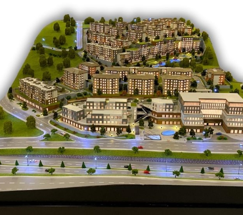 Maquettes physiques sur mesure d’ARI Maquette pour Interzum, comprenant des tours résidentielles, des centres commerciaux, des prototypes d’architecture intérieure et des projets de développement urbain. Enrichies d’effets lumineux, d’éléments animés