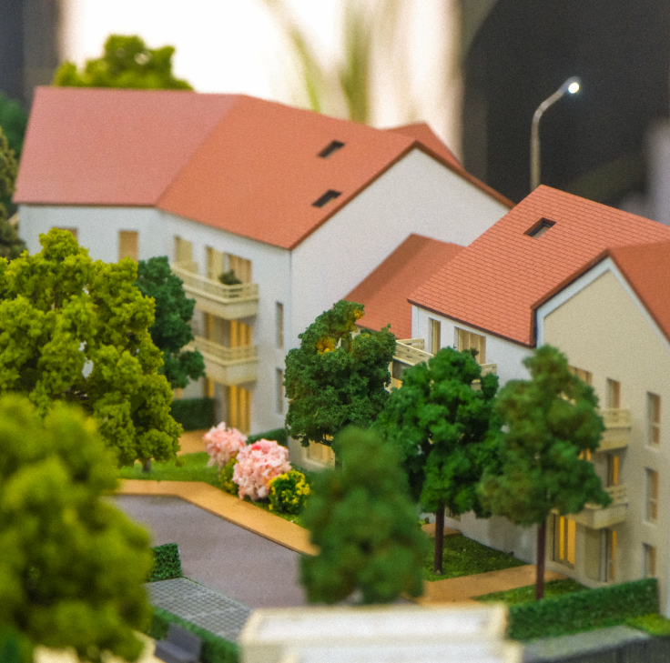 Maquettes animées et éclairées d’ARI Maquette pour Heimtextil, comprenant des centres de production textile, des concepts de showroom futuristes, des espaces d’exposition pour le commerce de détail, des pôles de matériaux durables et des intérieurs m