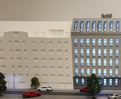 Maquette architecturale sur mesure, éclairée et animée, conçue par ARI Maquette pour le Vienna Tourism Forum, mettant en valeur des projets touristiques, hôteliers et urbains innovants. Grâce à une fabrication précise, des effets lumineux et des élém