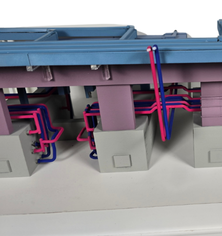 Maquette intralogistique illuminée et animée réalisée par ARI Maquette, illustrant les flux automatisés, la circulation en entrepôt et les systèmes intelligents de manutention.